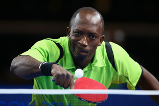 Segun Toriola of Nigeria in action during the singles mtach between Sharath Kamal Achanta of India and Segun Toriola of Nigeria in the Men's Team Table Tennis Final between India and Nigeria at Scotstoun Sports Campus during day five of the Glasgow 2014 Commonwealth Games on July 28, 2014 in Glasgow, United Kingdom.